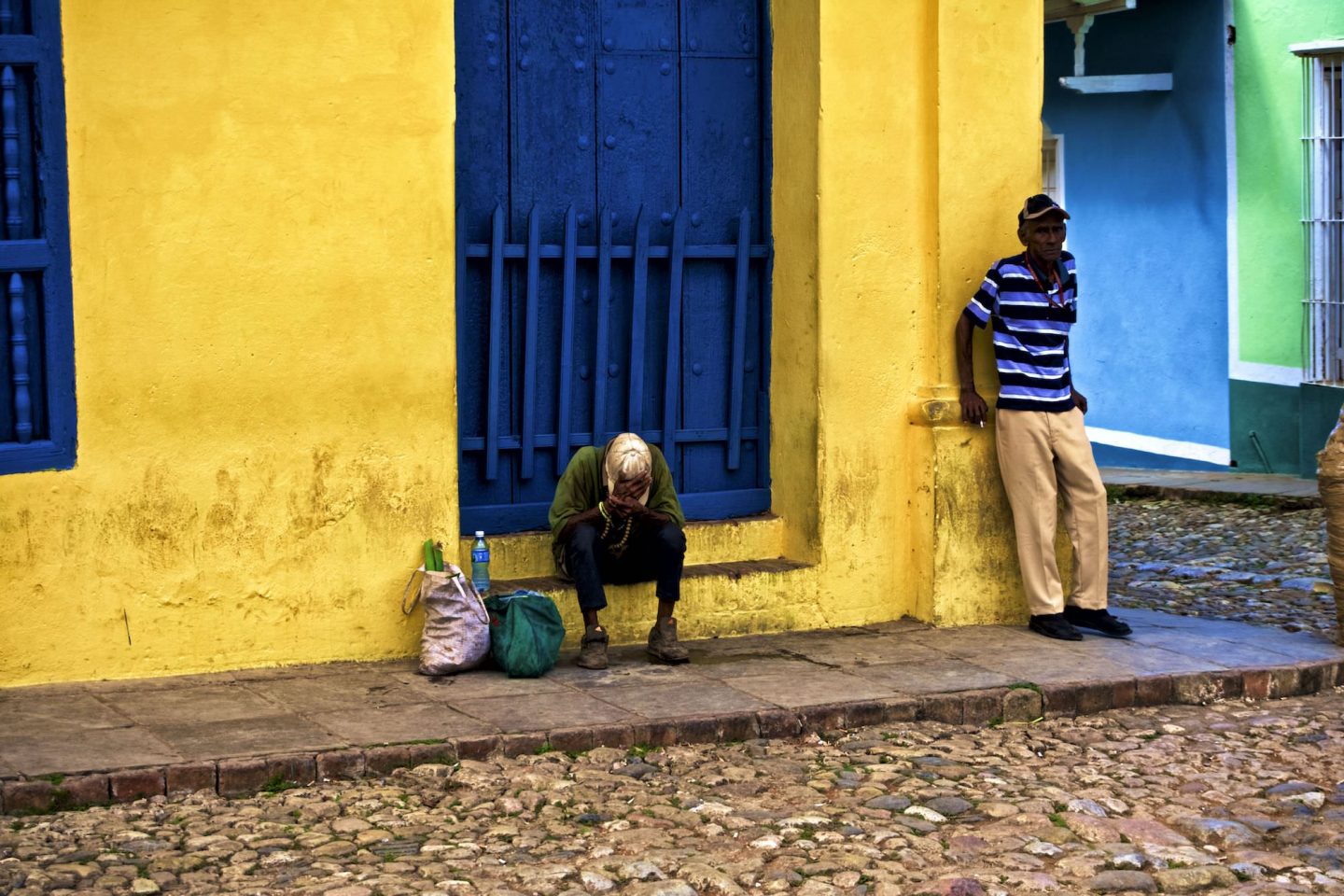 Cuban men in Trinidad. Daily life in Cuba.