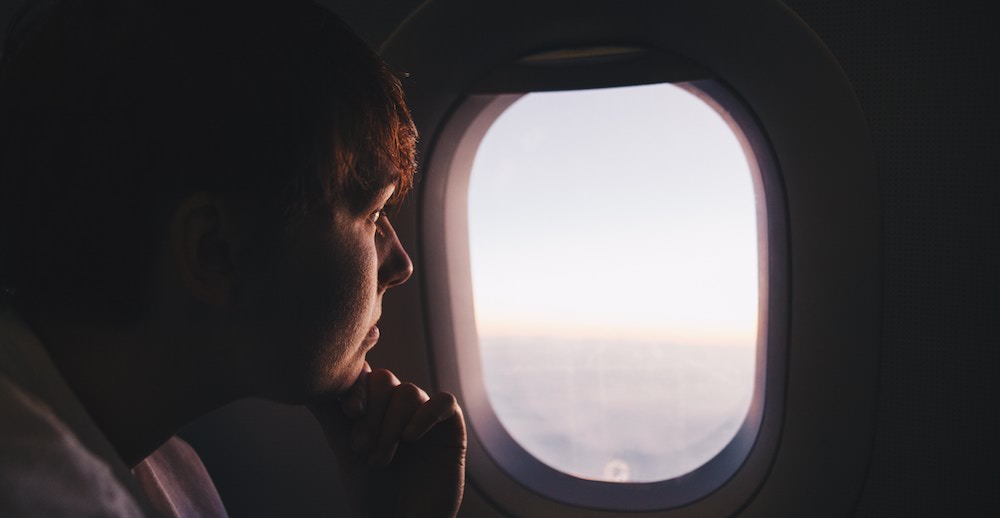 How to Overcome Your Fear of Flying - Looking Out Airplane Window