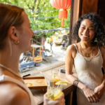 Traveler engaging with locals – How to Meet Locals When Traveling and build genuine connections during your journeys around the world