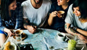 Traveler learning about local customs and traditions as part of cross-cultural preparation